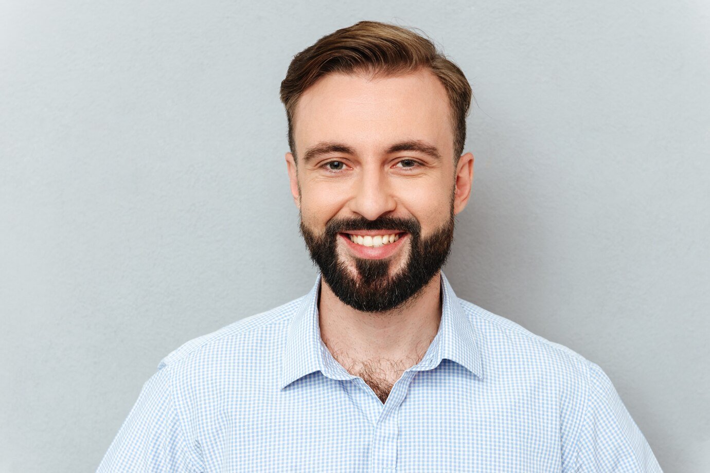 Portrait of a professional male engineer in light blue shirt